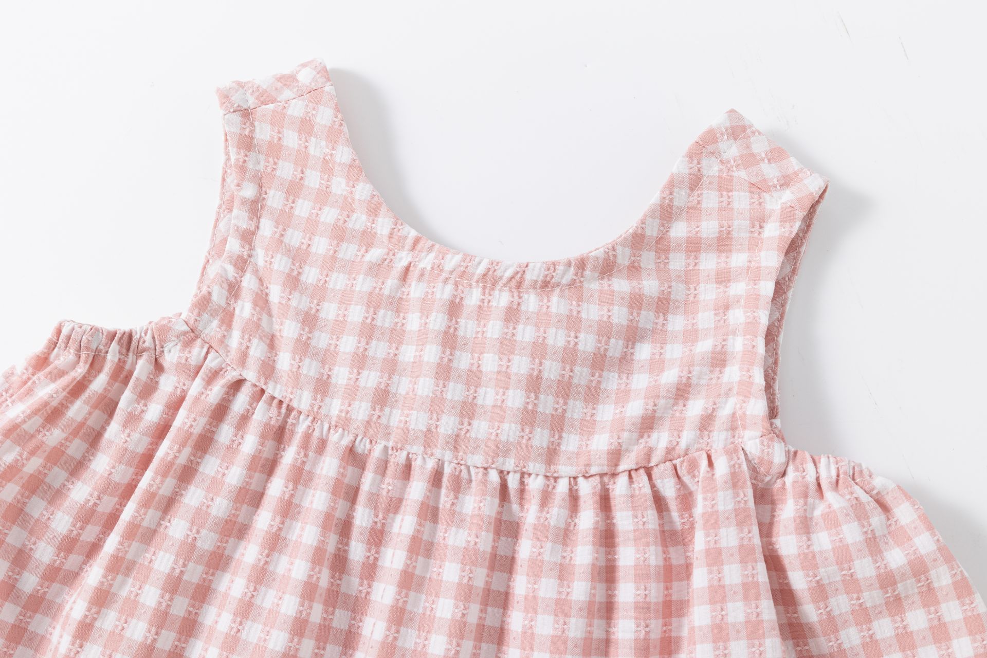 vêtement rose bébé vichy