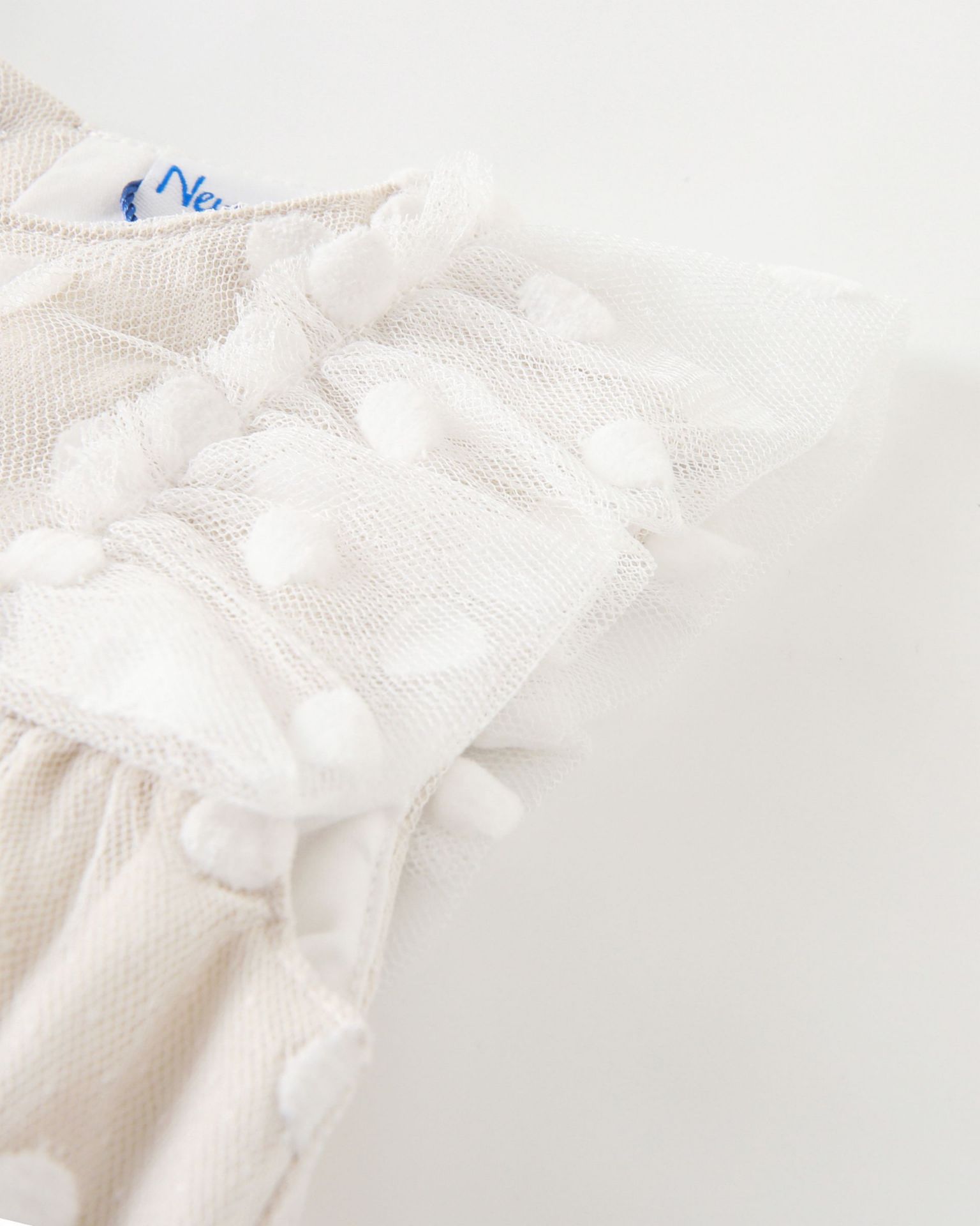 barboteuse beige à pois